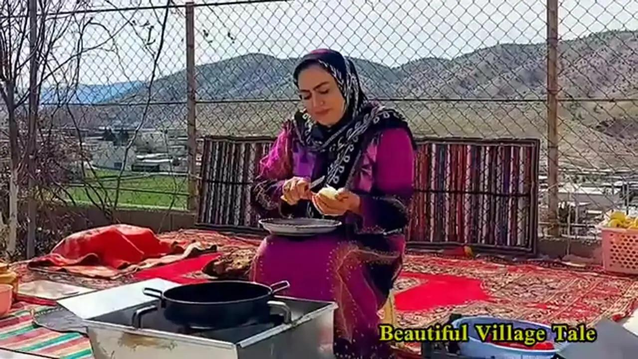 (ویدئو) فرآیند پخت نان ساجی و املت در به شیوه بانوی کرد زاگرس نشین